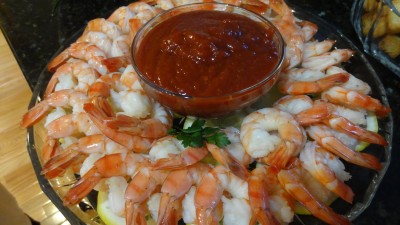 Platter of Cold Peeled Shrimp with Cocktail Sauce