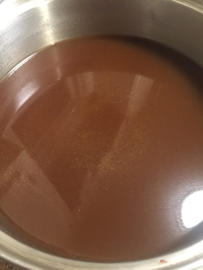 Veal stock simmering and reducing.