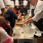 chef teaching a cooking class